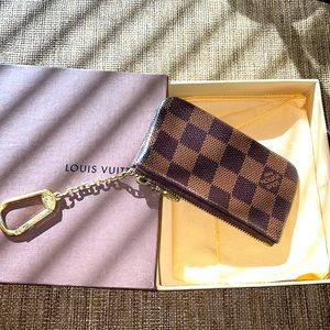 Authentic Louis Vuitton.